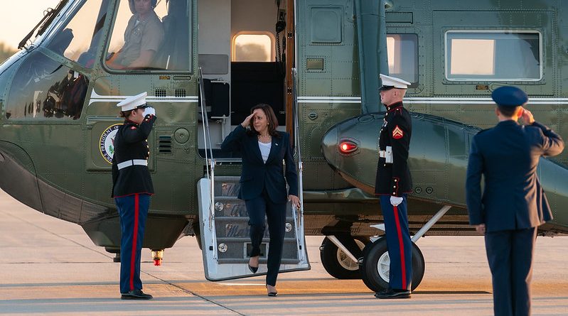 Vice President Kamala Harris salutes U.S. Marines as she disembarks Marine Two at Joint Base Andrews, Maryland, Friday, June 25, 2021, to begin her trip to El Paso, Texas. (Official White House Photo by Lawrence Jackson)